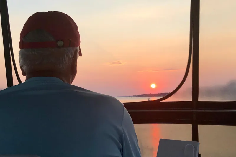 Slide: The Image of Man enjoying sunset view from 1988 Tollycraft 40 Sundeck Motor Yacht. - 3