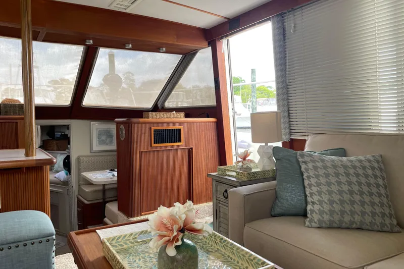 Slide: The Image of Interior of 1988 Tollycraft 40 Sundeck Motor Yacht with cozy seating and decor. - 32