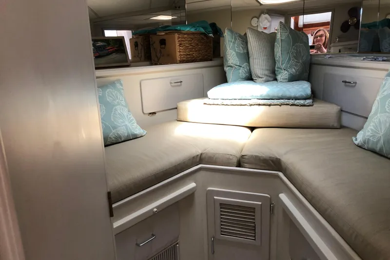 Slide: The Image of Interior of 1988 Tollycraft 40 Sundeck Motor Yacht with cozy seating and cushions. - 36
