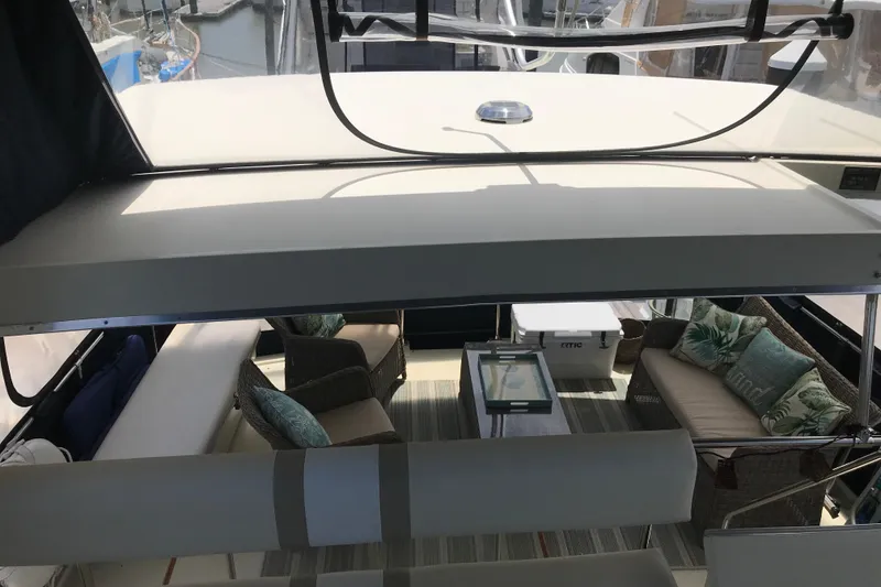 Slide: The Image of 1988 Tollycraft 40 Sundeck Motor Yacht interior with comfortable seating and stylish decor. - 43