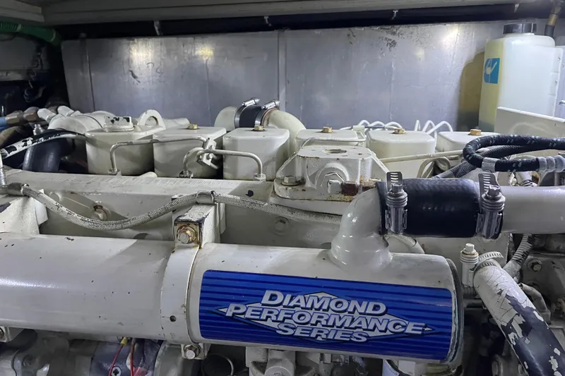 Slide: The Image of Engine room of 1988 Tollycraft 40 Sundeck Motor Yacht with Diamond Performance Series engine. - 48