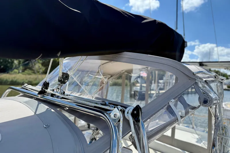 Slide: The Image of 1984 Tayana 55 sailboat cockpit with clear canopy and rigging details. - 17