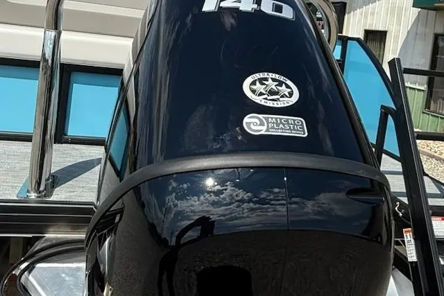 Slide: The Image of Outboard motor on 2026 Godfrey Xperience EX2086SFLX boat, featuring 140 horsepower. - 4