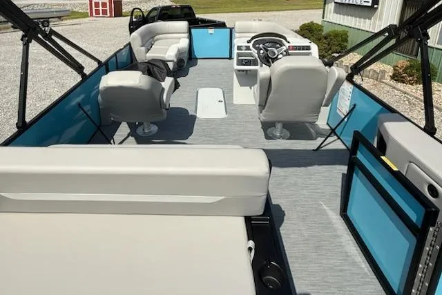 Slide: The Image of 2026 Godfrey Xperience EX2086SFLX pontoon boat interior with modern seating and steering console. - 5