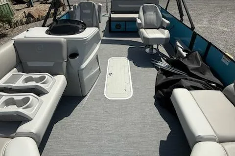 Slide: The Image of 2026 Godfrey Xperience EX2086SFLX pontoon boat interior with seating and helm. - 6