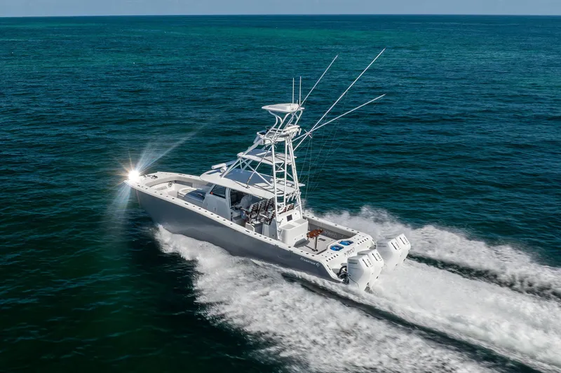 Slide: The Image of 2024 Freeman 43 boat cruising on open ocean waters. - 16