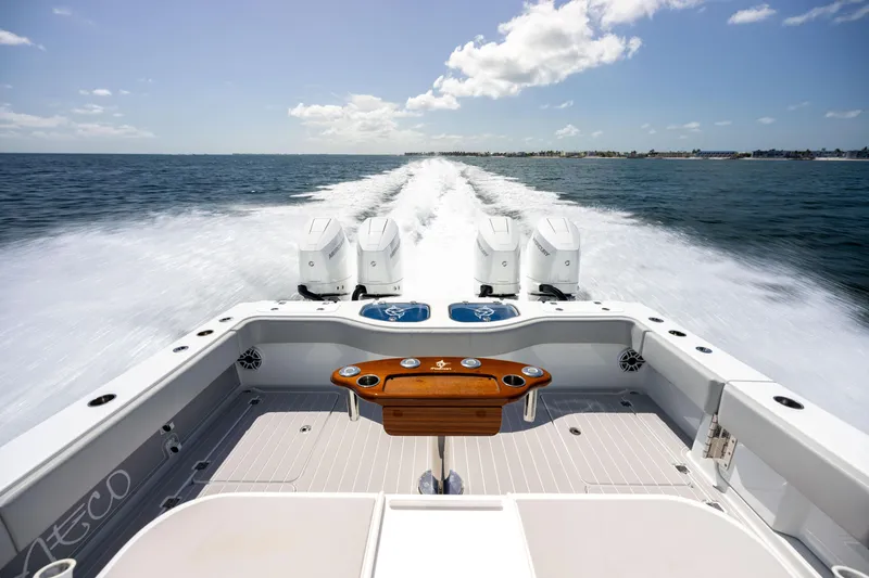 Slide: The Image of 2024 Freeman 43 boat cruising on open water, showcasing powerful engines and sleek design. - 22