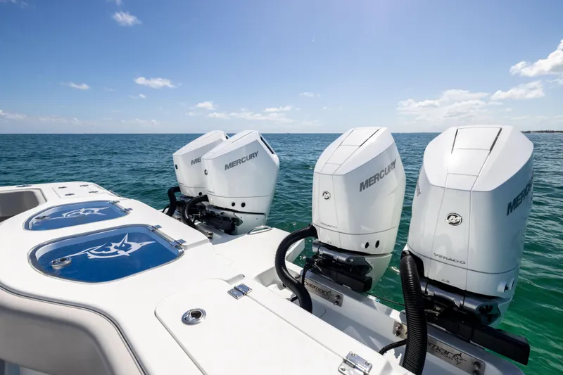 Slide: The Image of 2024 Freeman 43 boat with Mercury Verado engines on open sea. - 27
