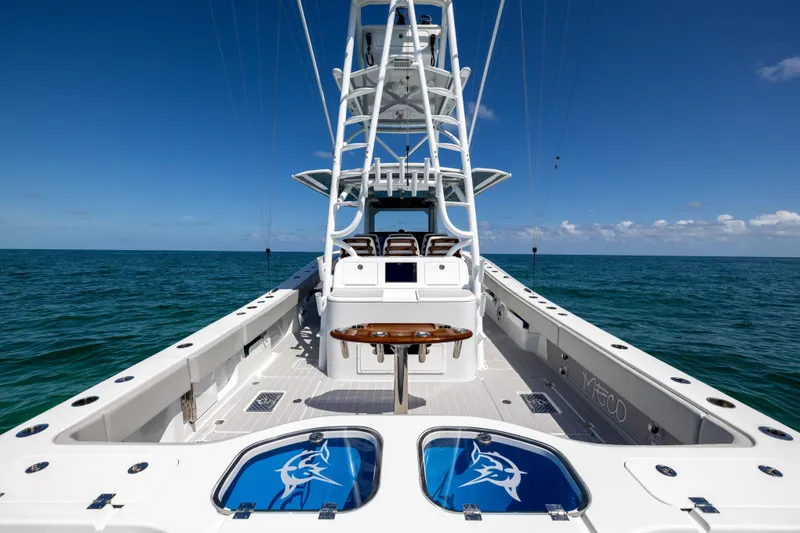 Slide: The Image of 2024 Freeman 43 boat on open sea, featuring spacious deck and modern design. - 29