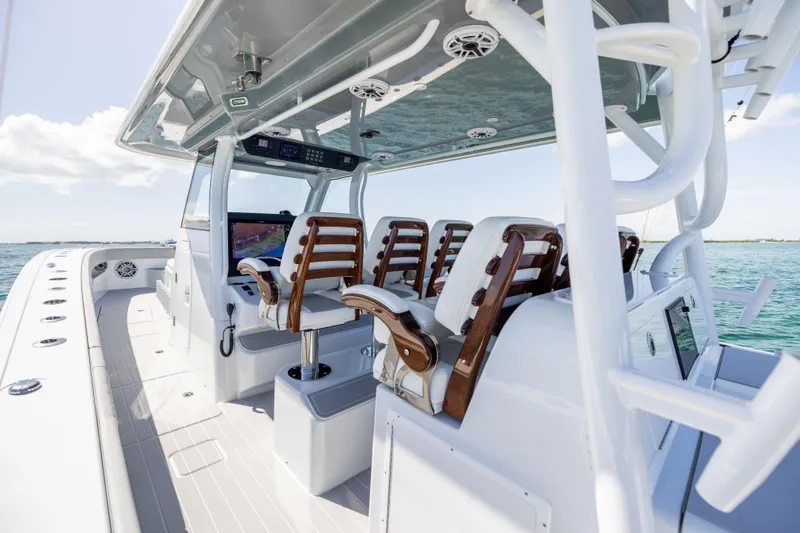 Slide: The Image of 2024 Freeman 43 boat interior with sleek seating and advanced navigation system. - 43