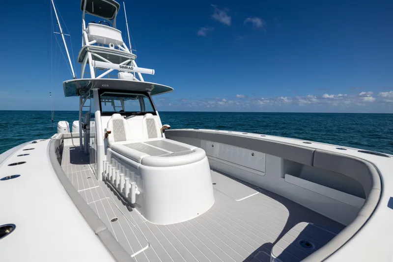Slide: The Image of 2024 Freeman 43 boat on open sea, featuring spacious deck and modern design. - 55