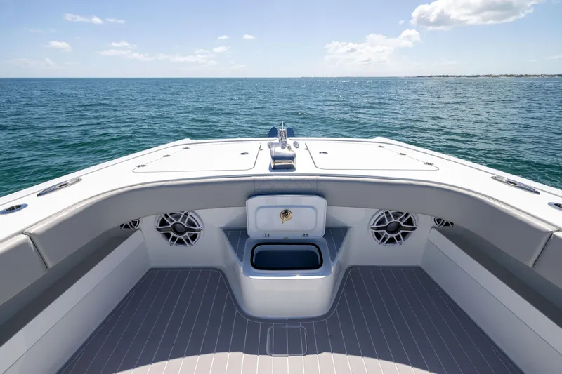 Slide: The Image of Bow view of 2024 Freeman 43 boat on open sea under clear sky. - 60