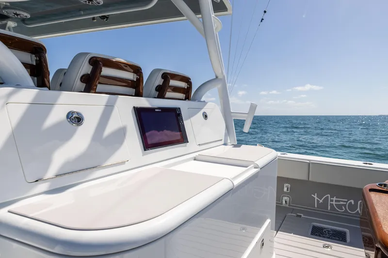 Slide: The Image of 2024 Freeman 43 boat interior with seating and ocean view. - 69