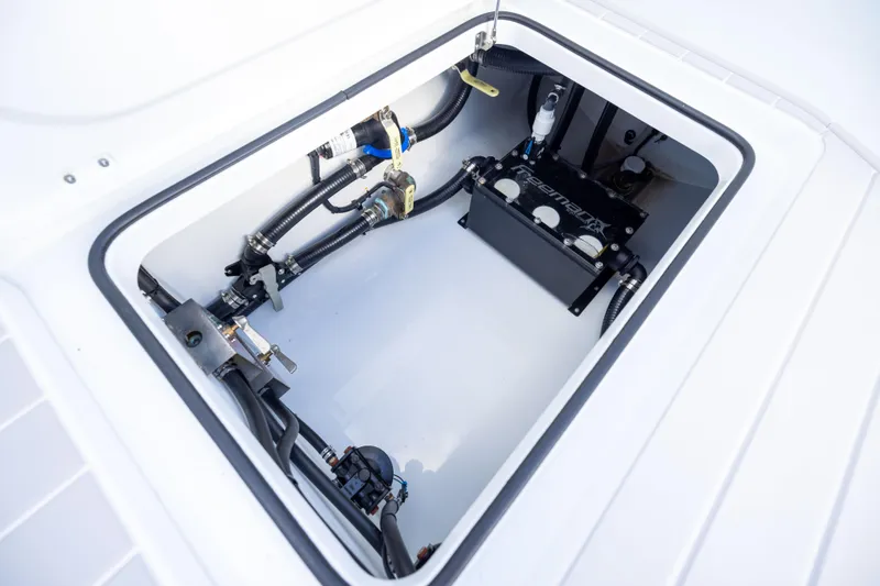 Slide: The Image of Freeman 43 (2024) boat compartment showcasing advanced plumbing and wiring systems. - 73