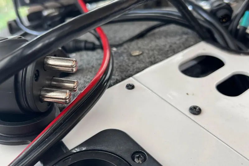 Slide: The Image of Close-up of wiring and connectors on a 2016 Lund 1875 Pro-V Bass XS boat. - 11
