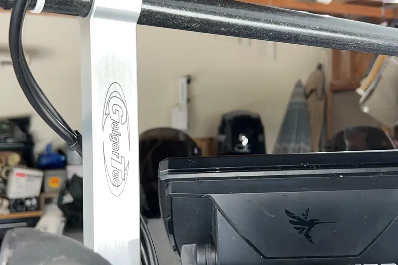 Slide: The Image of GeigerTec mount on 2016 Lund 1875 Pro-V Bass XS boat in garage setting. - 3
