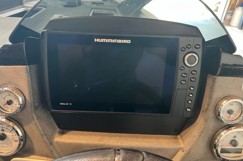 Slide: The Image of 2016 Lund 1875 Pro-V Bass XS dashboard with Humminbird Helix 10 fishfinder. - 5
