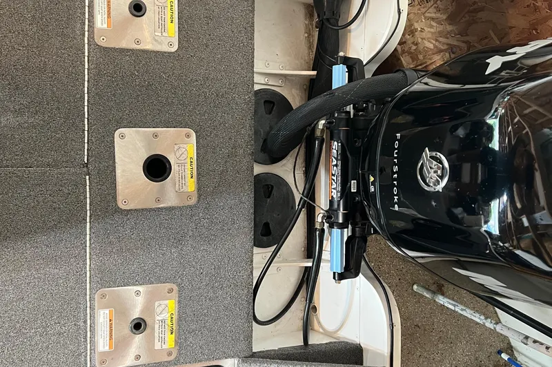 Slide: The Image of 2016 Lund 1875 Pro-V Bass XS boat engine and deck details. - 9