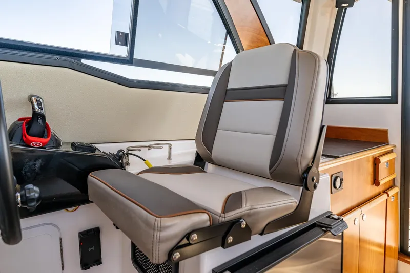 Slide: The Image of 2024 Cutwater C-248 Coupe interior seating with modern design and comfortable upholstery. - 26