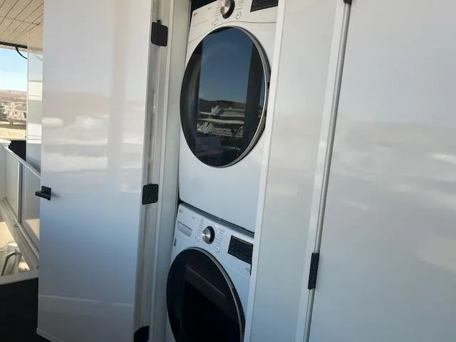 Slide: The Image of Stacked washer and dryer in Adonia Ovation Shared Ownership Trip 5, 2023 model. - 14