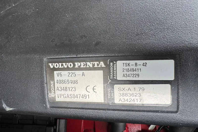 Slide: The Image of Volvo Penta engine label on 2015 Stingray 215 LR boat, displaying model and serial numbers. - 36