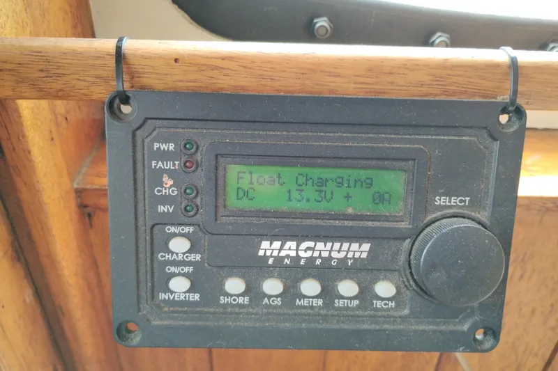 Slide: The Image of Magnum Energy charger display on 1983 Custom Entienne Francois 50 Pilothouse, showing float charging status. - 20