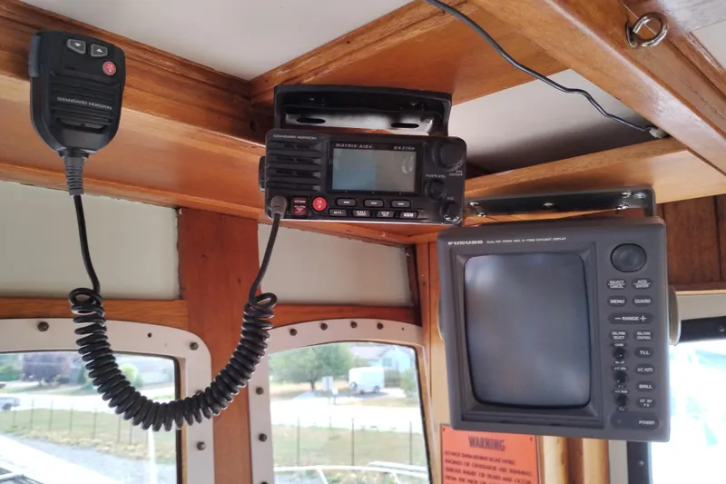 Slide: The Image of Interior of 1983 Custom Entienne Francois 50 Pilothouse with radio and navigation equipment. - 21