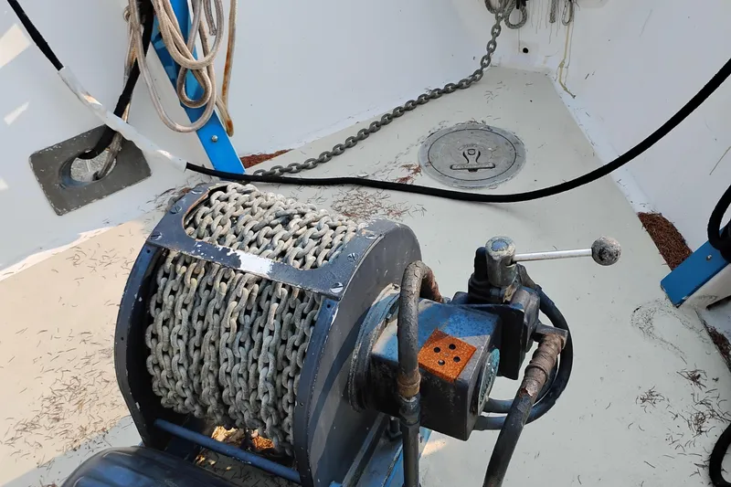 Slide: The Image of Anchor chain mechanism on 1983 Custom Entienne Francois 50 Pilothouse boat deck. - 3