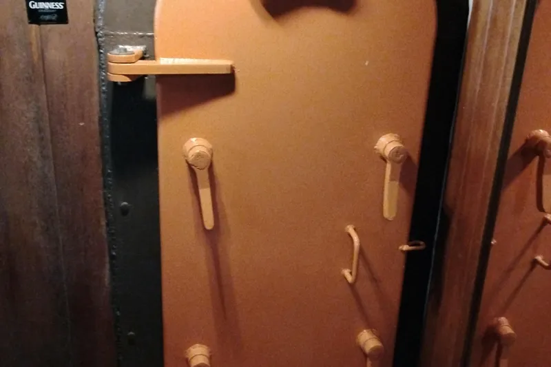 Slide: The Image of Orange metal door with handles on a Custom Entienne Francois 50 Pilothouse, 1983 model. - 35