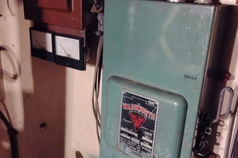Slide: The Image of Electrical panel with Wadsworth branding on a 1983 Custom Entienne Francois 50 Pilothouse. - 40