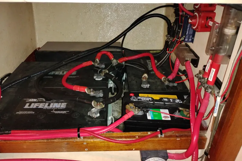 Slide: The Image of Battery compartment of 1983 Custom Entienne Francois 50 Pilothouse with Lifeline batteries. - 41