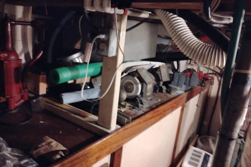 Slide: The Image of Engine room of 1983 Custom Entienne Francois 50 Pilothouse with mechanical components. - 43
