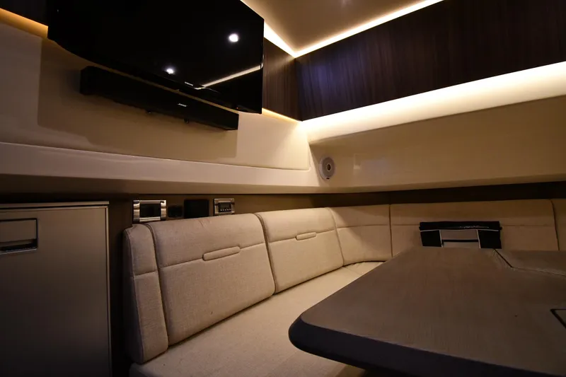 Slide: The Image of Luxurious interior of 2020 Sea Ray SLX 400 Outboard with plush seating and modern amenities. - 51