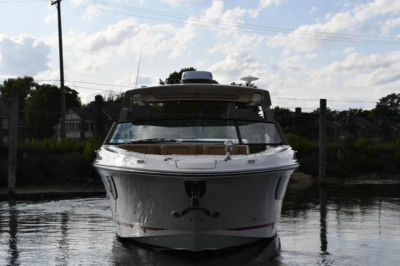 Slide: The Image of 2020 Sea Ray SLX 400 Outboard boat on calm water, front view. - 67