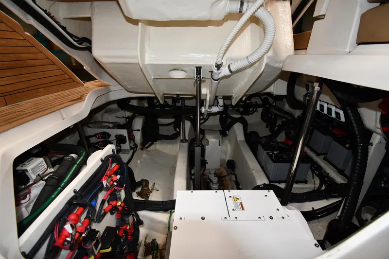Slide: The Image of Engine compartment of 2020 Sea Ray SLX 400 Outboard, showcasing wiring and mechanical components. - 68