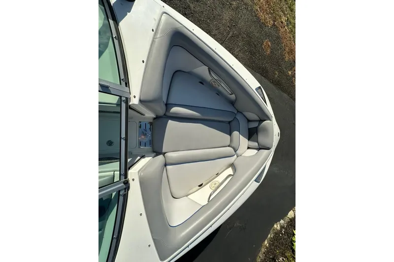 Slide: The Image of 2006 Centurion Enzo SV230 boat interior with gray cushioned seating. - 17