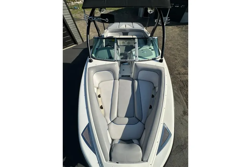 Slide: The Image of 2006 Centurion Enzo SV230 boat with sleek interior and comfortable seating. - 19