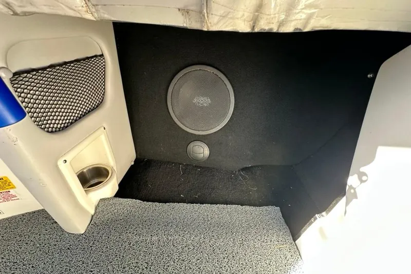 Slide: The Image of 2006 Centurion Enzo SV230 interior with speaker and cup holder. - 21