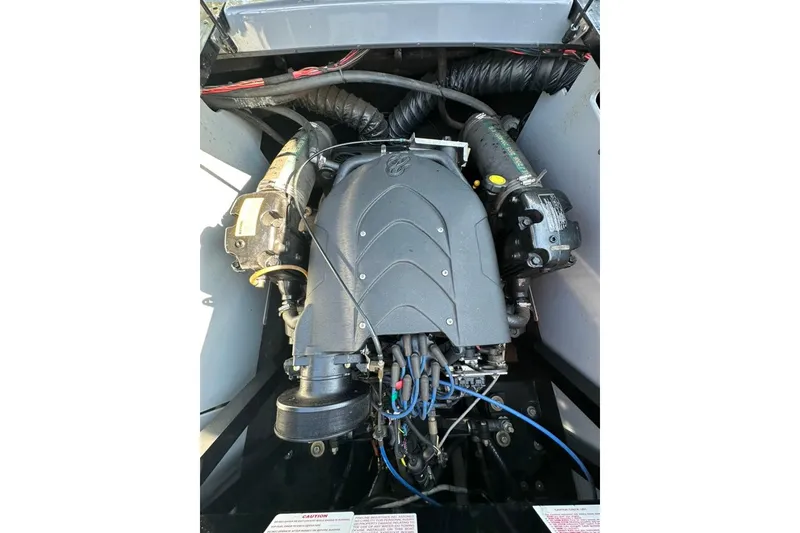 Slide: The Image of 2006 Centurion Enzo SV230 engine compartment, showcasing detailed mechanical components. - 22