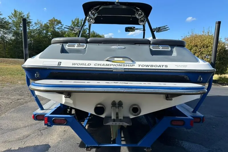 Slide: The Image of 2006 Centurion Enzo SV230 boat on trailer, rear view, "World Championship Towboats" branding. - 7