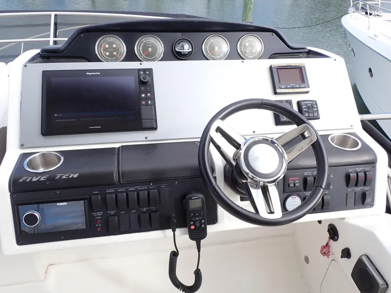 Slide: The Image of Luxurious 2015 Sea Ray 510 Fly yacht with spacious seating and elegant design. - 27