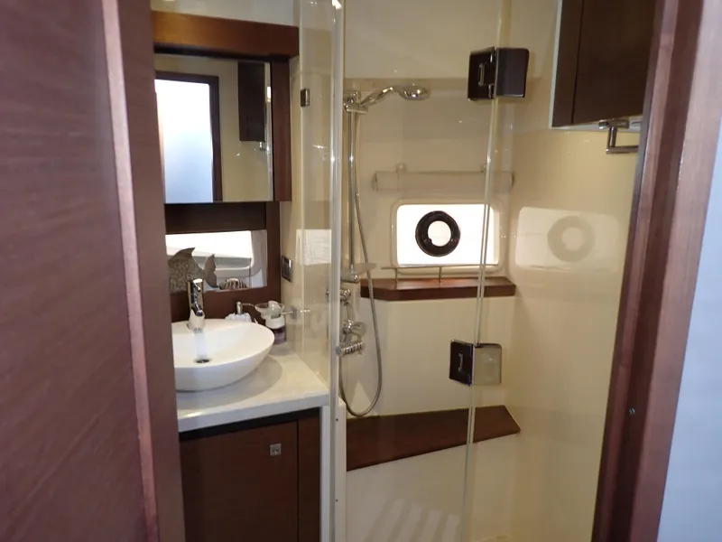 Slide: The Image of Luxurious bathroom interior of 2015 Sea Ray 510 Fly yacht with modern sink and shower. - 42