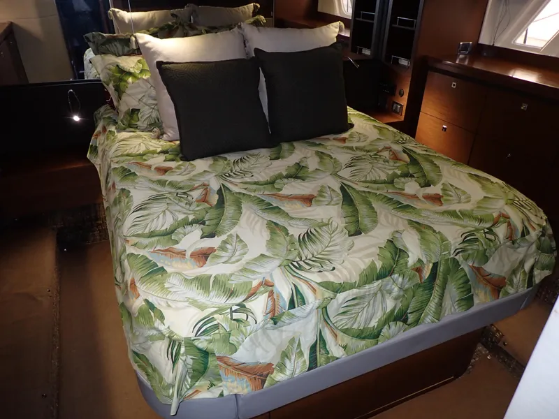 Slide: The Image of Luxurious cabin interior of 2015 Sea Ray 510 Fly yacht with tropical bedding. - 46