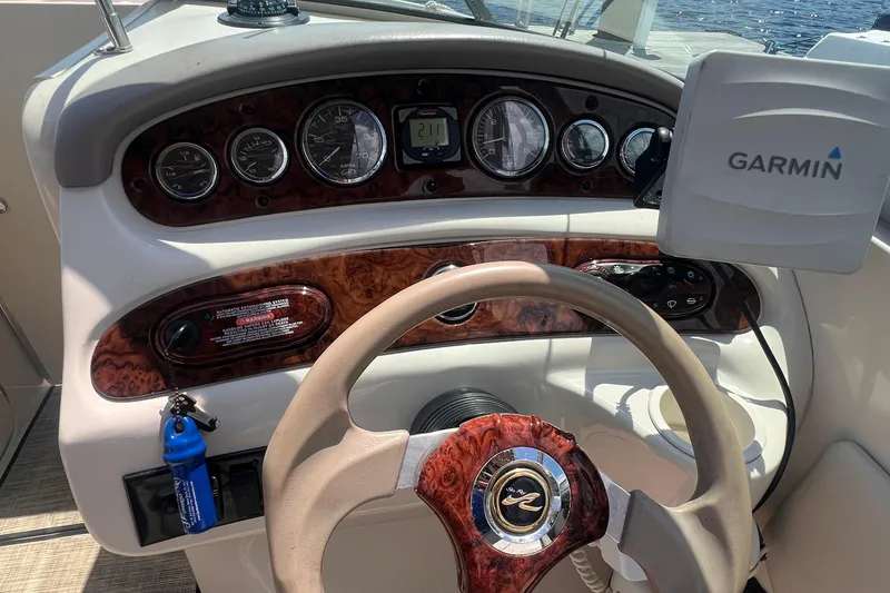 Slide: The Image of Garmin echoMAP 50s on 2003 Sea Ray 240 Sundeck boat dashboard. - 11