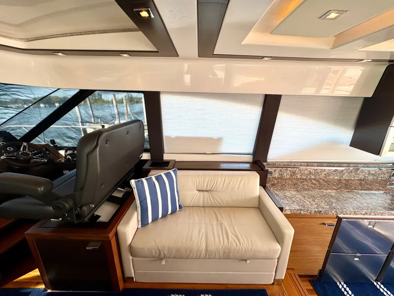 Slide: The Image of Salon - Starboard Side Seating w/ Breaker Panel Below - 44