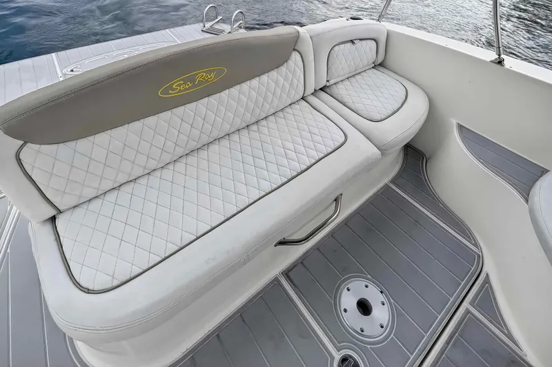 Slide: The Image of 2007 Sea Ray 290 Sundancer boat seating with quilted upholstery and sleek design. - 16