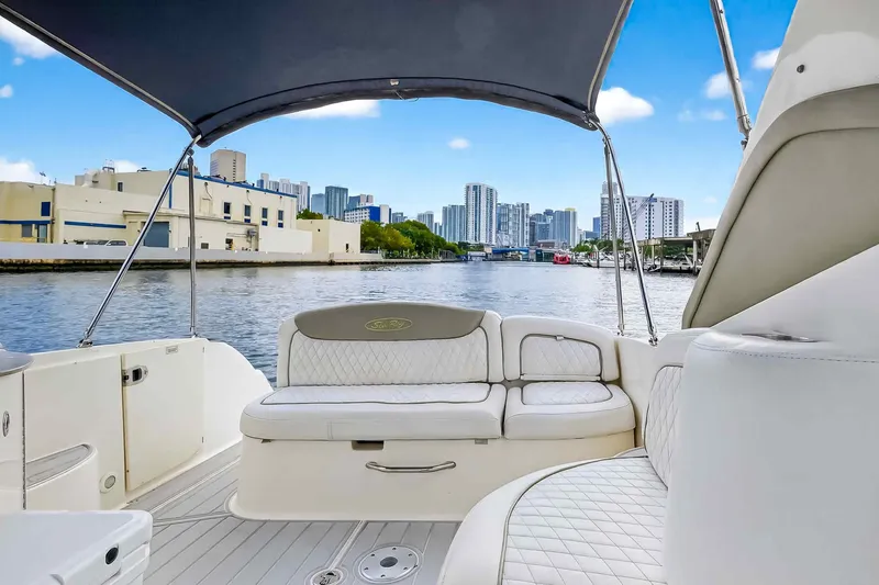 Slide: The Image of 2007 Sea Ray 290 Sundancer boat interior with city skyline view. - 20