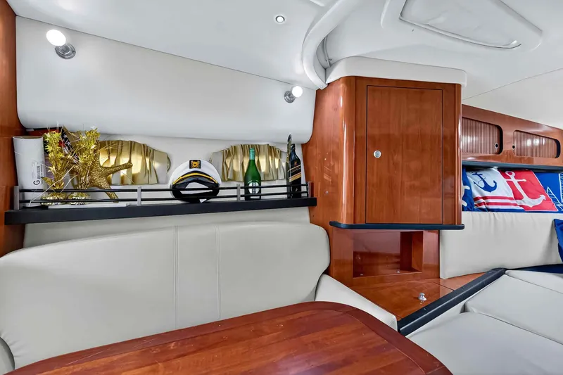Slide: The Image of Luxurious interior of 2007 Sea Ray 290 Sundancer with elegant decor and seating. - 29