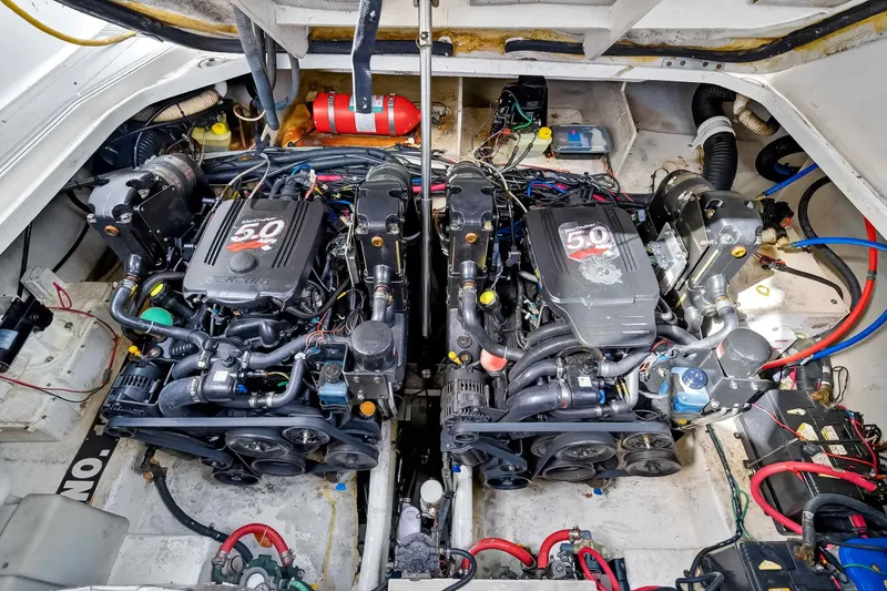 Slide: The Image of Engine compartment of a 2007 Sea Ray 290 Sundancer with twin MerCruiser engines. - 40