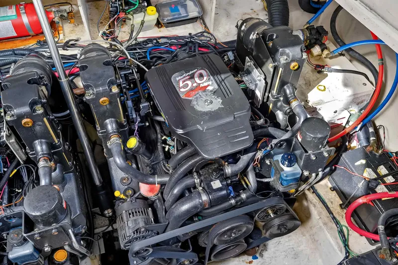 Slide: The Image of Engine compartment of a 2007 Sea Ray 290 Sundancer with a 5.0-liter engine. - 41